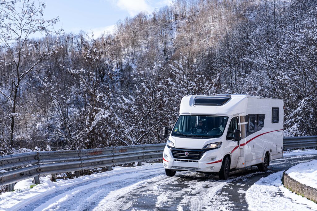 motorhome in winter on a snowy road